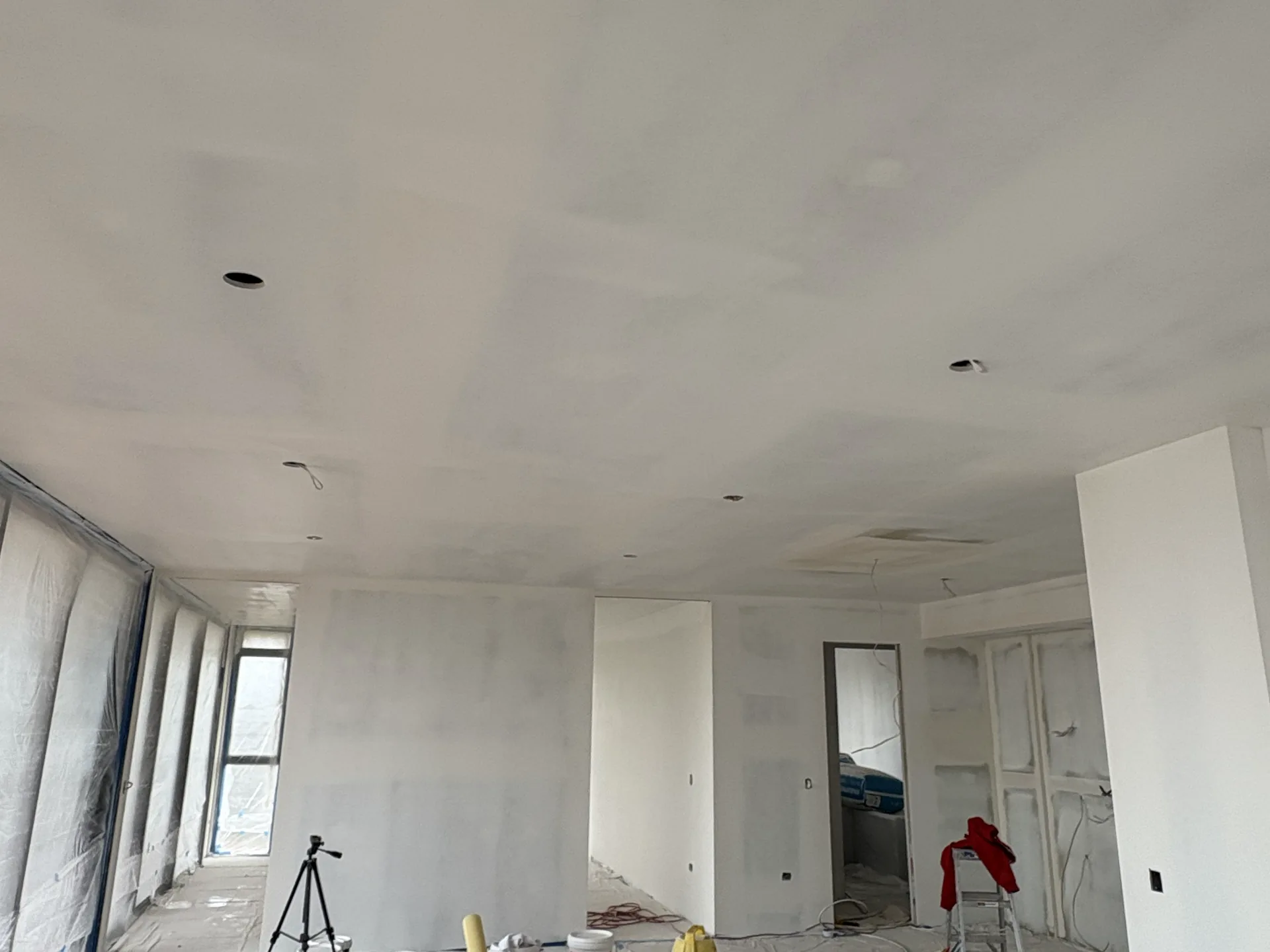 Protected interior space during plastering and painting prep